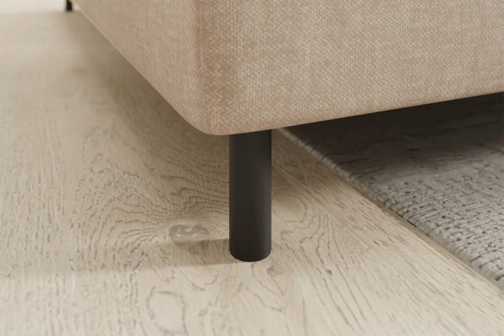 BAREA ágyazható sarokgarnitúra ágyneműtartóval BAREA sarokgarnitúra láb közelről – ELTAP kárpit textúra