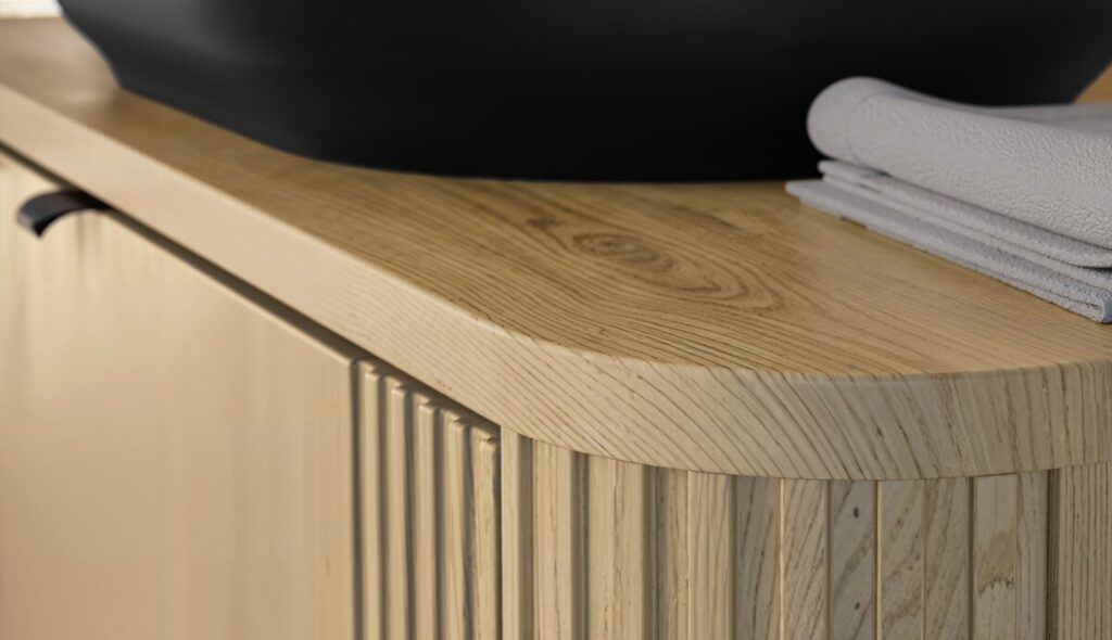 Hosszú fa hatású mosdópult lap kerekített sarokkal és törölközőkkel – fürdőszoba hangulatkép